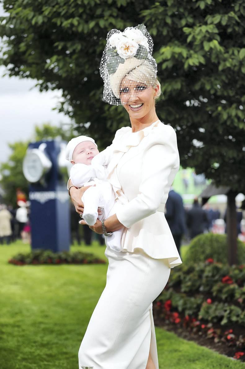 PARROT MOUTH: Stunning new mum scoops the prize