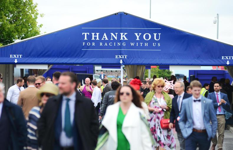 IRISH DERBY: Racegoers grin and bear it